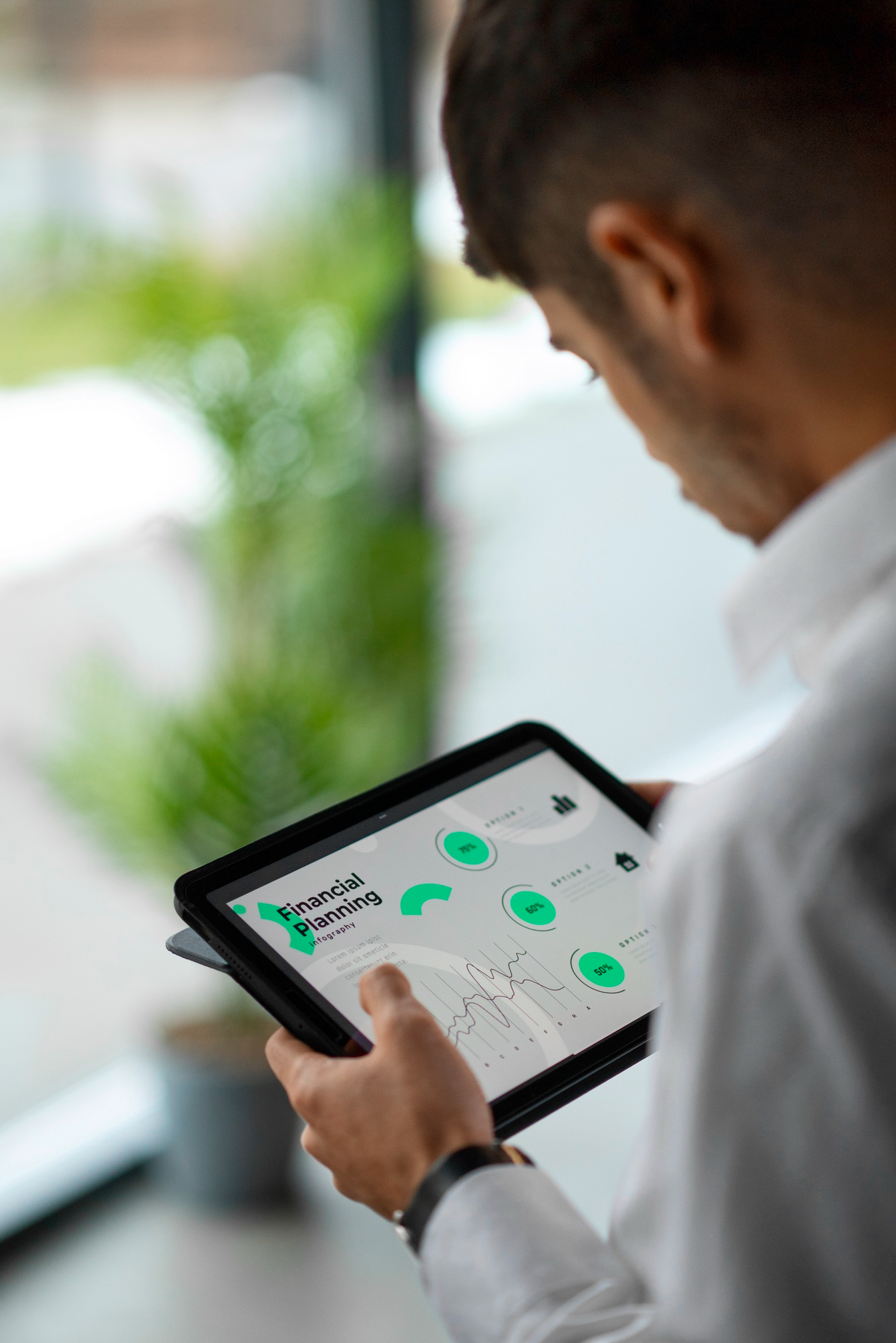 Advisor reviewing a financial planning infographic on a tablet